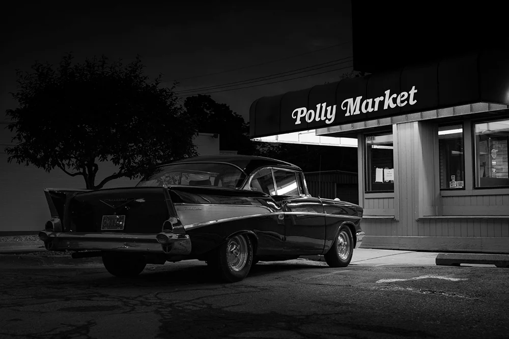 Classic car outside of grocery store